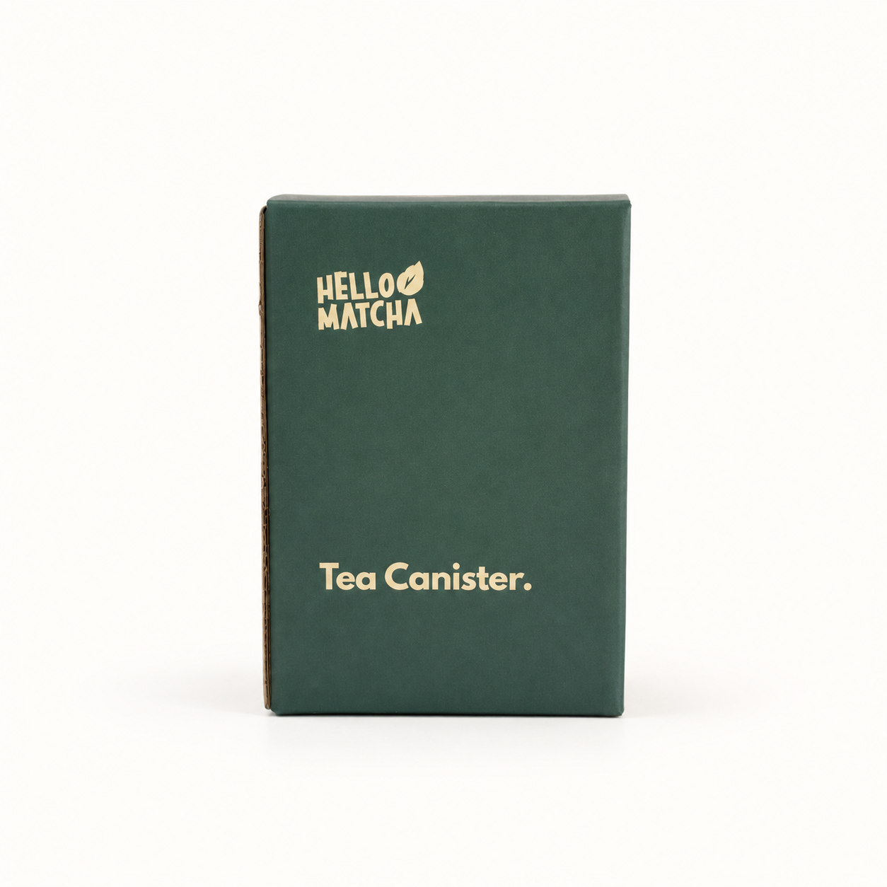 A dark green rectangular box for Hello Matcha Tea Canister, featuring gold foil text and logo, set against a plain white background.