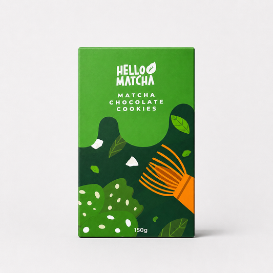 A rectangular box of Hello Matcha Matcha Chocolate Cookies, featuring a green and dark green design with white text and illustrations of matcha leaves and a whisk on a light gray background.